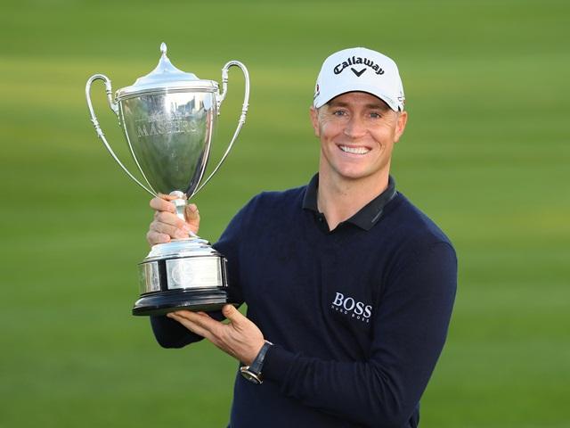 Alex Noren with his latest prize